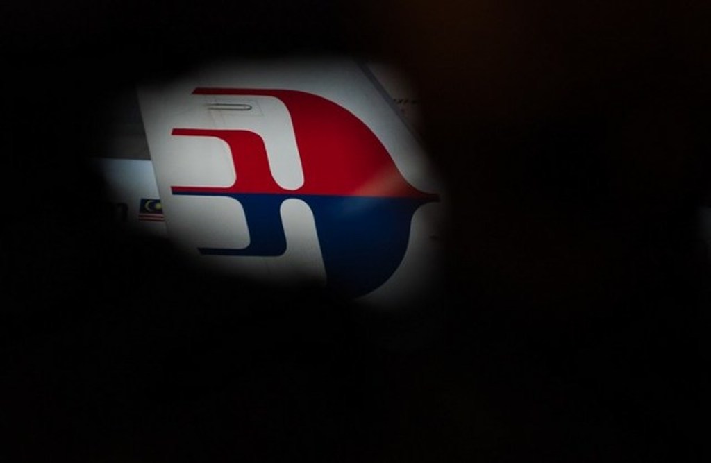 A Malaysia Airlines logo is pictured at Kuala Lumpur International Airport (KLIA) in Sepang on March 8, 2015. Mohd Rasfan/AFP.