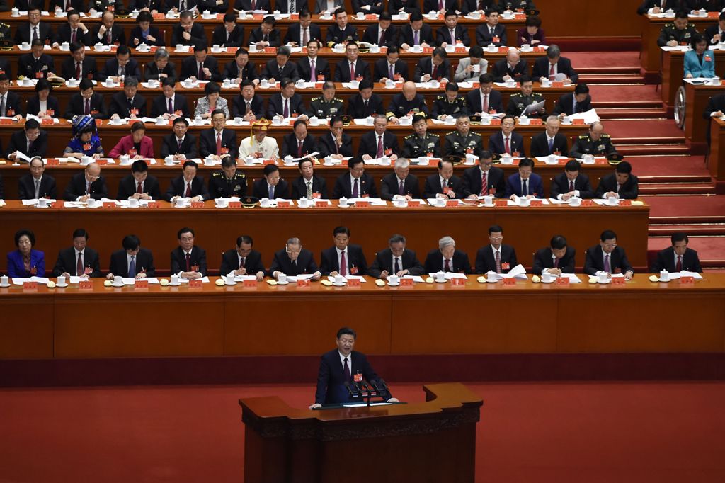 China's President Xi Jinping gives a speech at the opening session of the Chinese Communist Party's five-yearly Congress at the Great Hall of the People in Beijing on October 18, 2017. AFP / WANG ZHAO

