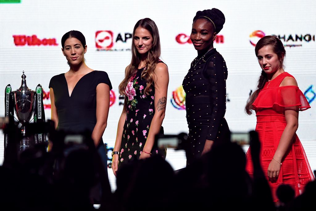 (From left) Garbine Muguruza of Spain, Karolina Pliskova of Czech Republic, Venus Williams of the United States and Jelena Ostapenko of Latvia pose for photographers during the Official Draw Ceremony of the WTA Finals Singapore on October 20, 2017. AFP / 