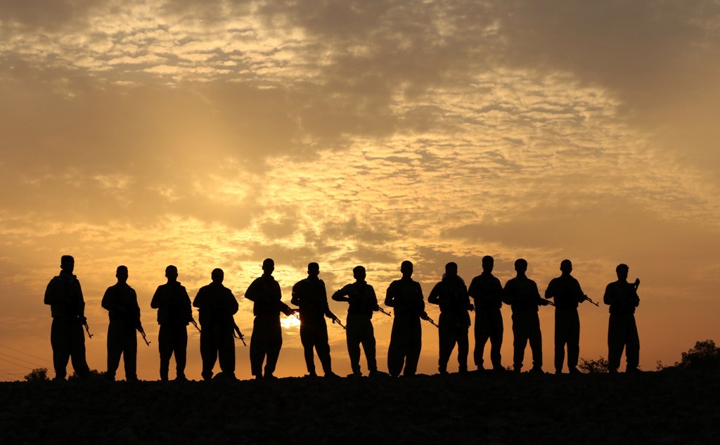 Iranian Kurdish Peshmerga, members of the Iranian Kurdistan Democratic Party (KDP-Iran), take part in routine military exercise in Koya, 100 kms east of Arbil, the capital of the autonomous Kurdish region of northern Iraq, on October 22, 2017. / AFP / SAF