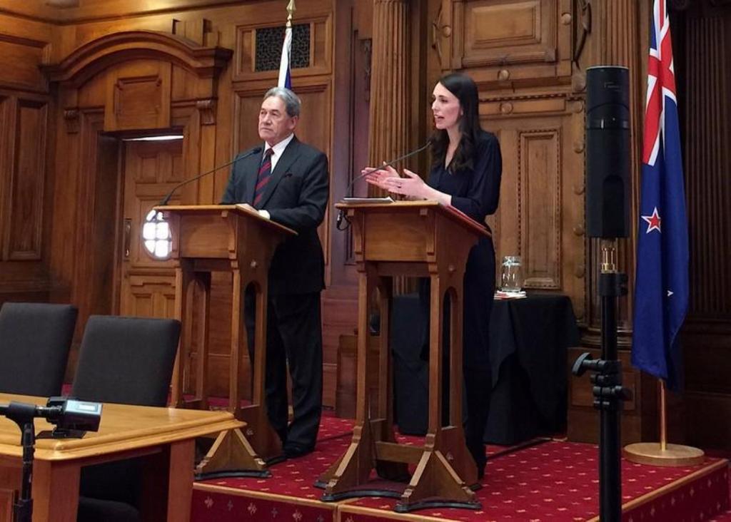 New Zealand's Prime Minister-designate Jacinda Ardern speaks as she stands next to New Zealand First party leader Winston Peters after their meeting in Wellington, New Zealand, October 24, 2017. REUTERS/Nicolaci da Costa.