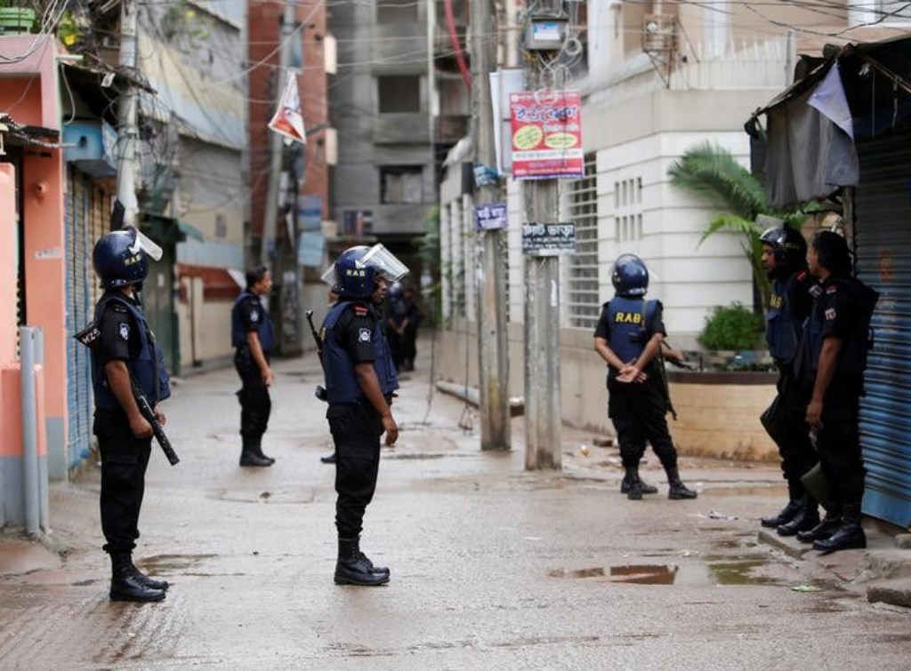 A file photo of security personnel blocking a road near the site of a police operation on militants on the outskirts Dhaka, Bangladesh, July 26, 2016. Reuters/Mohammad Ponir Hossain.