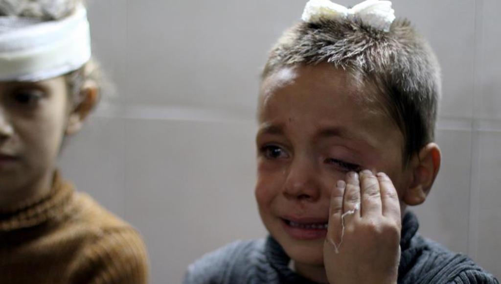 A wounded child cries as he receives treatment after Assad Regime forces attacked to the de-conflict zone Sabqa city of Damascus, at a hospital in the Eastern Ghouta region of Damascus, Syria on October 29, 2017. Samir Tatin - AA
