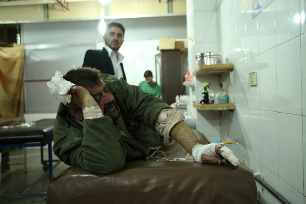 A man lays on a stretcher after receiving treatment, who was injured in an attack carried out by Assad regime forces, which hit a de-escalation zone, at a military hospital in Eastern Ghouta region of Damascus, Syria on October 29, 2017. Ammar Süleyman - 