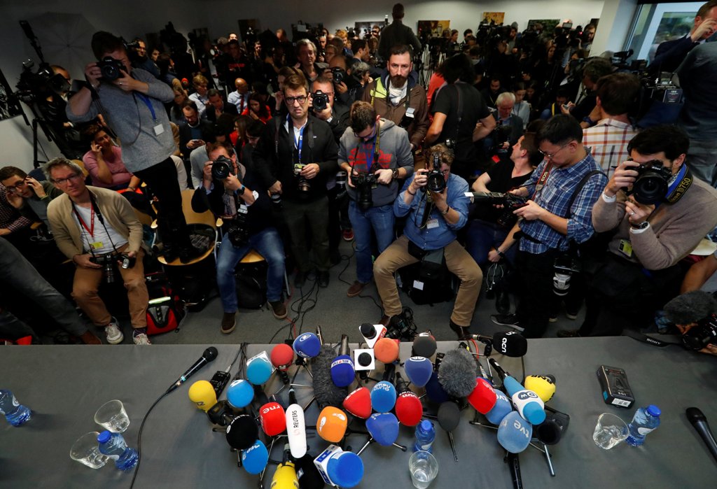 Journalists await the arrival of sacked Catalan leader Carles Puigdemont at the Press Club Brussels Europe where he is expected to give a news conference in Brussels, Belgium, October 31, 2017. REUTERS/Yves Herman