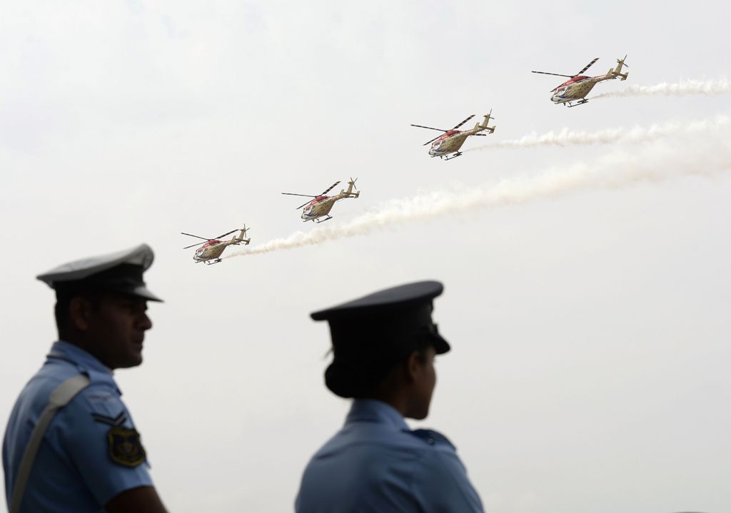 A file photo of Indian Air Force officers as they watch Chetak helicopters perform in an air show during the combined graduation parade at the Air Force Academy at Dundigal in Hyderabad June 17, 2017. AFP / NOAH SEELAM