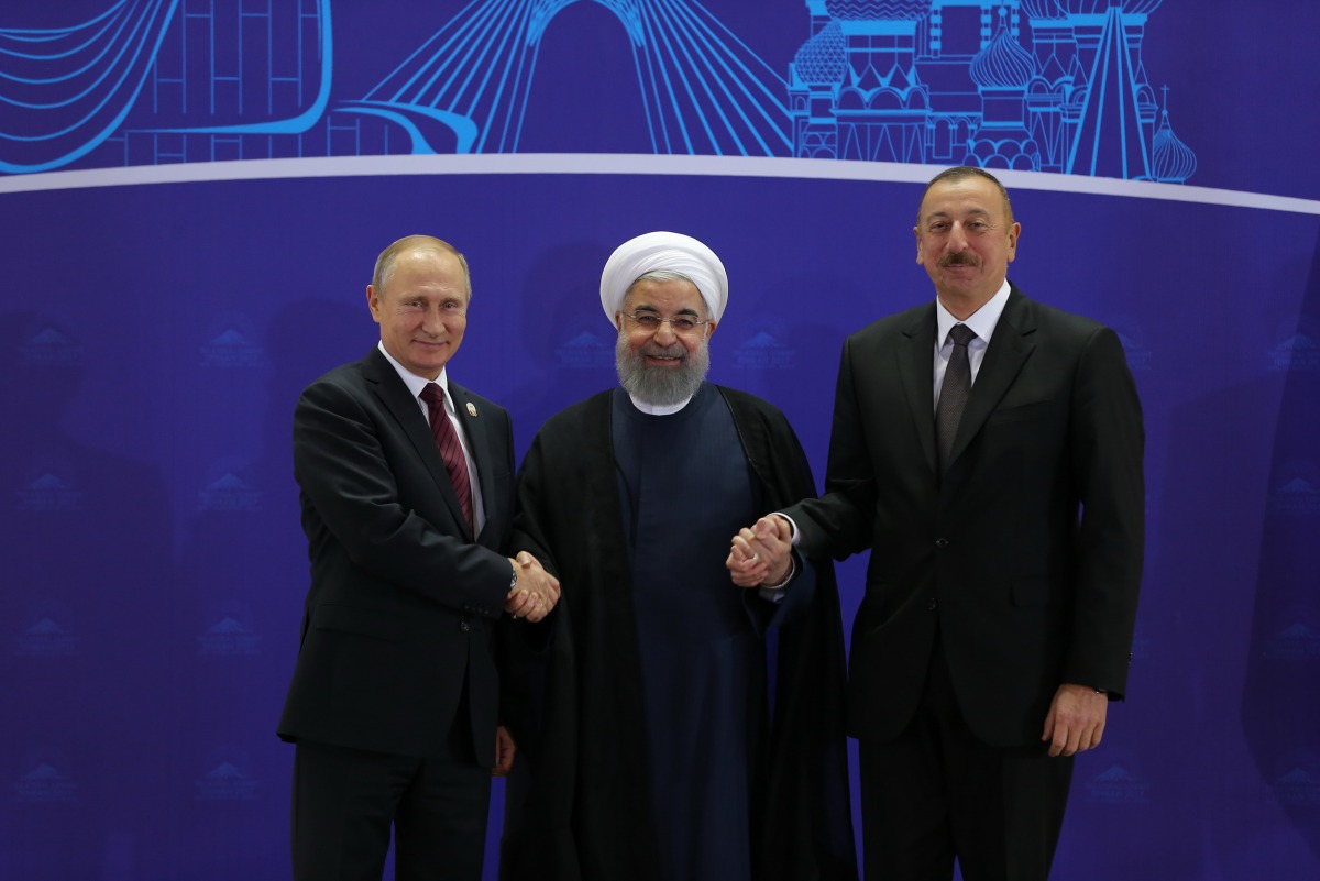 Russian President Vladimir Putin (L), Iranian President Hassan Rouhani (C) and Azerbaijani President Ilham Aliyev (R) pose for a photo during the 2nd trilateral summit between Iran, Russia and Azerbaijan in Tehran, Iran on November 01, 2017. (Iranian Pres