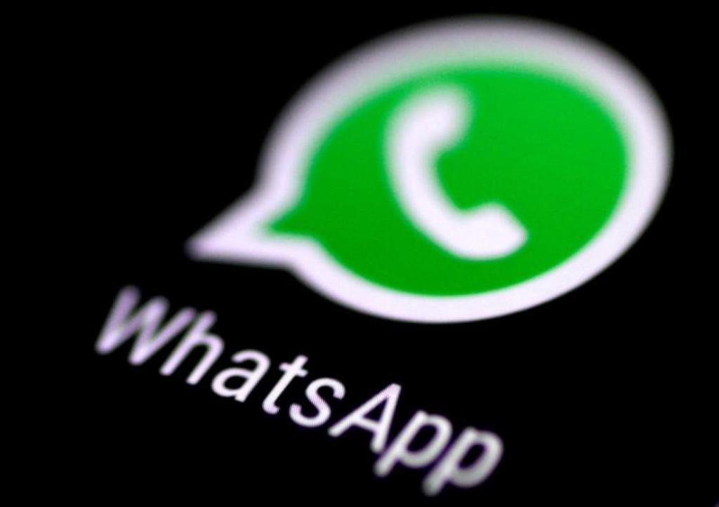 FILE PHOTO: The WhatsApp messaging application is seen on a phone screen August 3, 2017. REUTERS/Thomas White/File Photo.