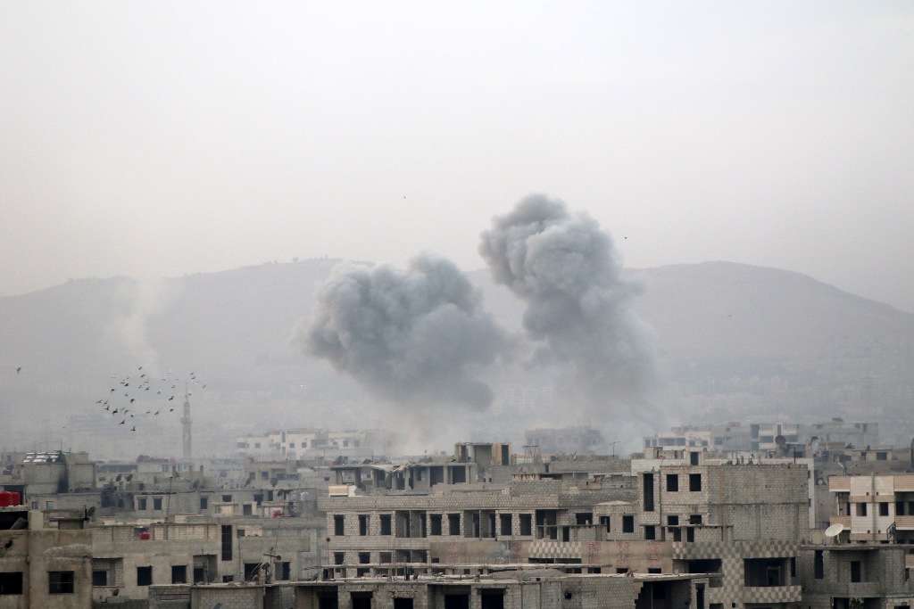 Smoke rises after Assad regime's airstrikes hit the de-escalation zone of Arbin town of the Eastern Ghouta region in Damascus, Syria on November 08, 2017. Diaa Al Din - AA

