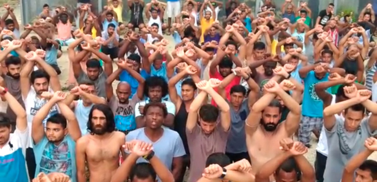 Assylum seekers react to the PNG court decision on Manus Island, Papua New Guinea, in this picture taken from social media November 7, 2017. Social Media/ via Reuters