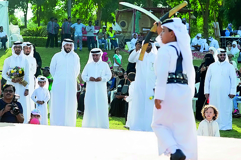 Visitors watching a traditional dance during the MIA Community Day event at the Museum of Islamic Art Park yesterday. 
