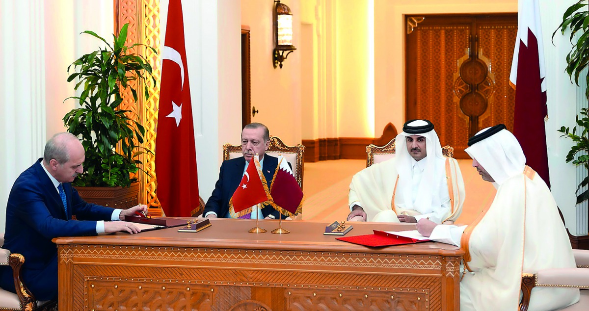 Emir H H Sheikh Tamim bin Hamad Al Thani and Turkish President, Recep Tayyip Erdogan, at the signing of cooperation agreement, yesterday.