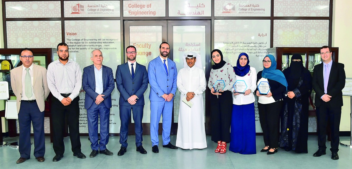 Students and staff of Computer Science and Engineering (CSE) at Qatar University College of Engineering (QU-CENG) with the mementos after coming first in DELL-EMC Envision the Future Competition 2017. 