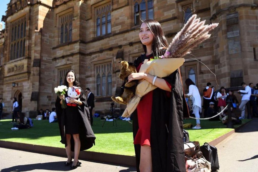 A file photo of graduated students. AFP. 