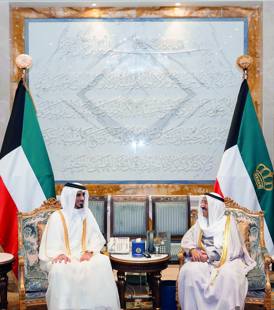The Emir of Kuwait, H H Sheikh Sabah Al Ahmed Al Jaber Al Sabah, with H H Sheikh Jassim bin Hamad Al Thani, the Personal Representative of H H the Emir, at Bayan Palace yesterday.