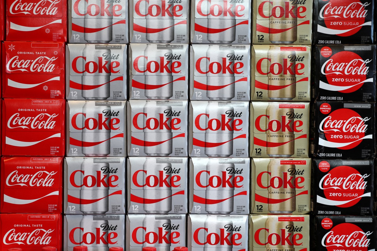 Boxes of Coca-Cola are seen at a grocery store in Los Angeles, California U.S. November 21, 2017. Reuters/Lucy Nicholson  