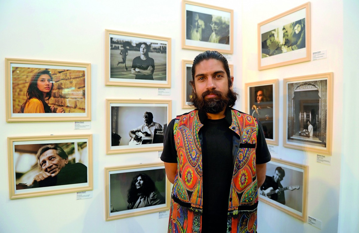 Pakistani photojournalist Mobeen Ansari with some of his works at the “Beautiful Pakistan, Amazing Qatar” photography exhibition which also features works by Qatari artist Haya Al  Thani, at Ezdan Mall yesterday.  Pic: Abdul Basit / The Peninsula