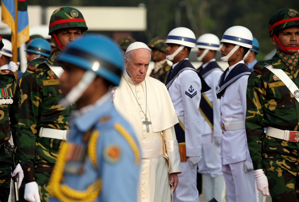 Pope Francis attends a welcome ceremony after arriving at the airport in Dhaka, Bangladesh November 30, 2017. REUTERS/Max Rossi
