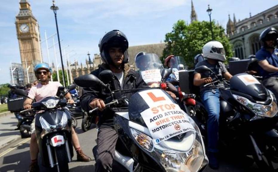 Delivery riders protest in London as the number of acid attacks continues to increase AFP/NIKLAS HALLE'N.