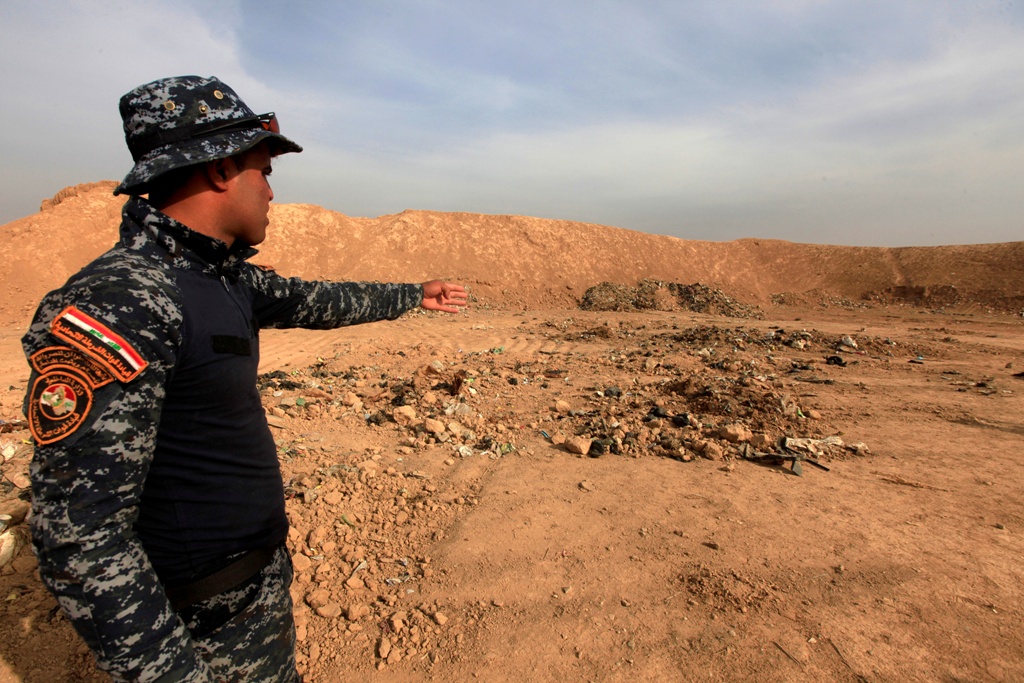 A file photo of a mass grave in Iraq. Alaa Al-Marjani/REUTERS