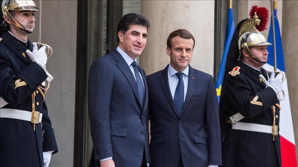 French President Emmanuel Macron (R) welcomes Prime Minister of Iraqi Kurdish Regional Government (IKRG) Nechervan Barzani (L) at Elysee Palace in Paris, France on December 2, 2017. ( Lucien Camosso - Anadolu Agency ).