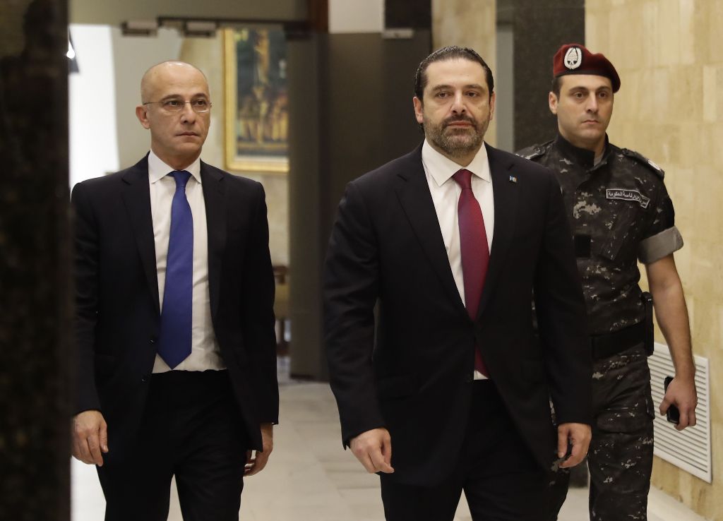 Lebanese Prime Minister Saad Hariri (C) arrives to attend a cabinet meeting at the presidential palace of Baabda, east of the capital Beirut, on December 5, 2017. / AFP