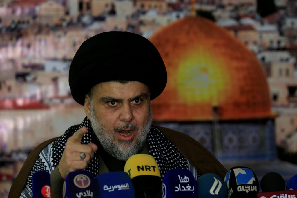 Iraqi Shi'ite Muslim leader Moqtada al-Sadr gestures as he delivers a speech over U.S.President Donald Trump's decision to recognize Jerusalem as the capital of Israel, in Baghdad, Iraq December 7, 2017. REUTERS/Alaa al-Marjani.
