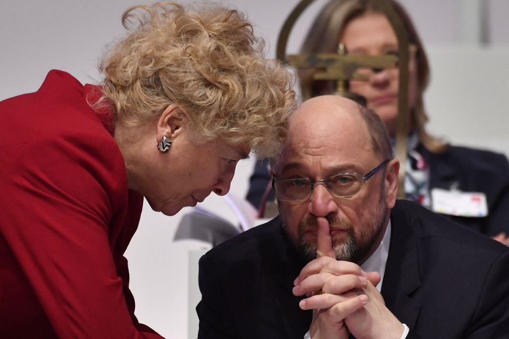 Leader of the Social Democratic Party (SPD), Martin Schulz (R) talks to member of the Social Democratic Party Gesine Schwan during a party congress of Germany's Social Democrats in Berlin, on December 7, 2017. 