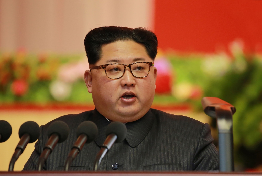This December 12, 2017 picture released from North Korea's official Korean Central News Agency (KCNA) on December 13, 2017 shows North Korean leader Kim Jong-Un attending the 8th Conference of Munitions Industry in Pyongyang. AFP PHOTO/KCNA VIA KNS