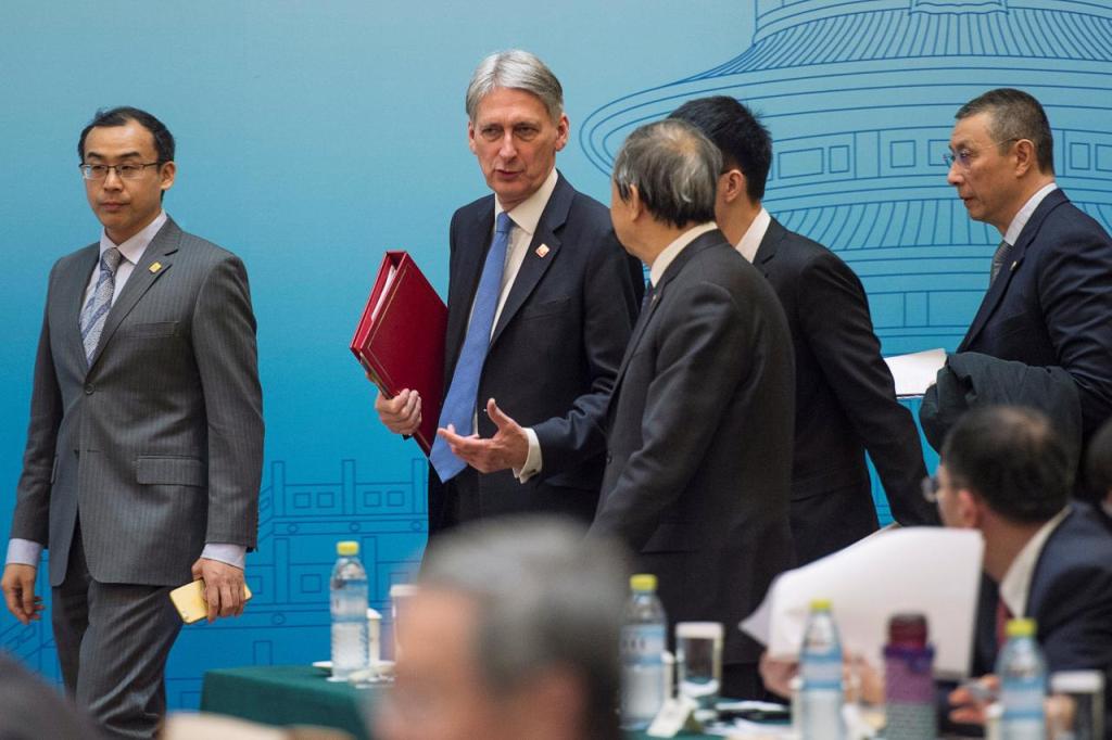 Britain's Chancellor of the Exchequer Philip Hammond and Chinese Vice Premier Ma Kai attend the UK-China Economic Financial Dialogue at the Diaoyutai State Guesthouse in Beijing, China December 16, 2017. REUTERS/Fred Dufour/Pool.