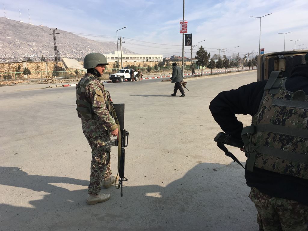 Afghan security forces arrive at the side of an ongoing attack in Kabul on December 18, 2017. Militants stormed an intelligence agency training facility in Kabul on December 18, officials said, triggering intense fighting with police in the latest attack 