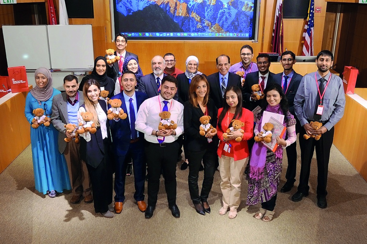 Students from five different countries who stayed at Weill Cornell Medicine-Qatar for a week, pose for a photograph.