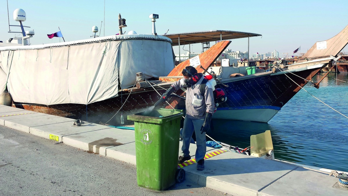 A Municipal official takes part in combating drive.