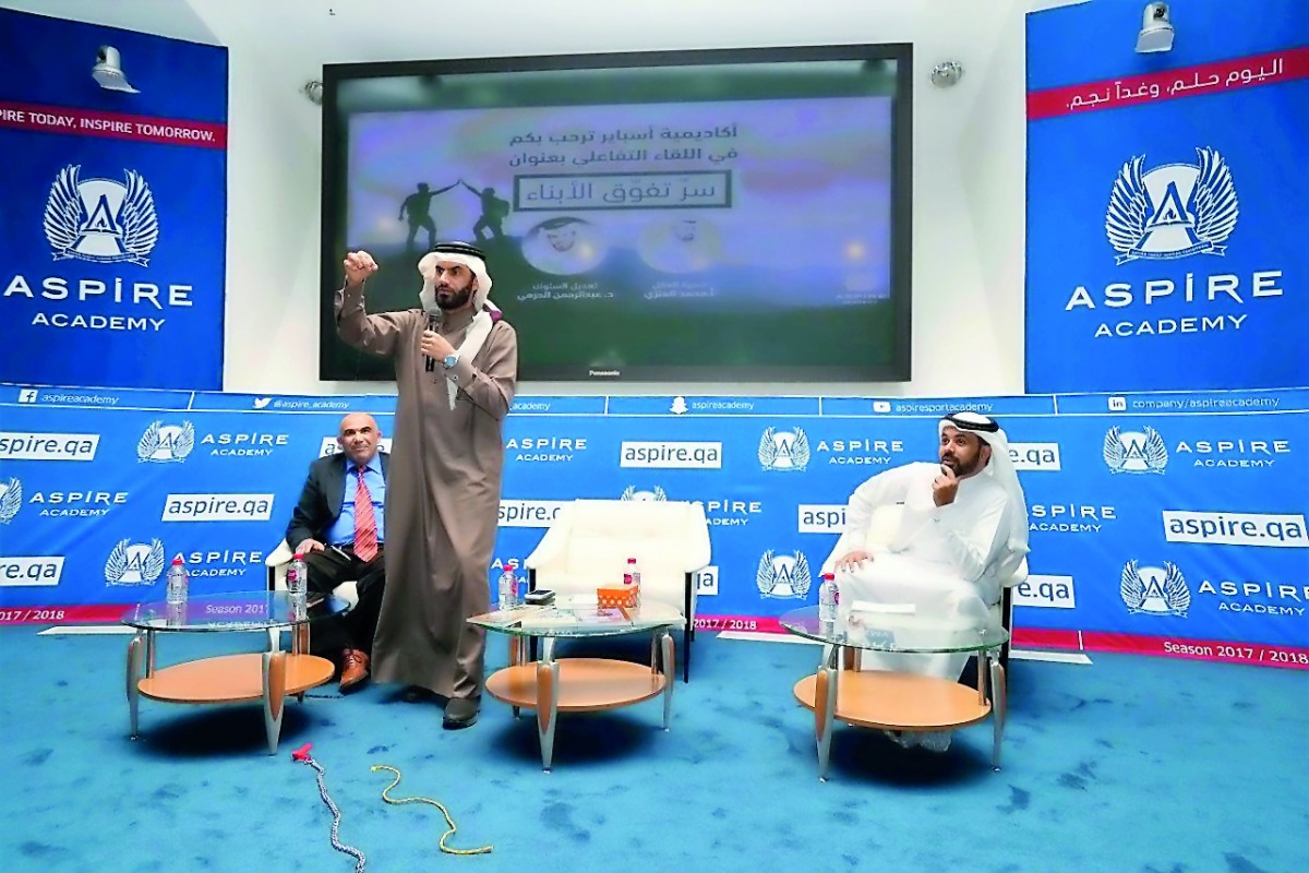 Dr Abdulrahman Al Harami speaks during the session as Dr Jamil Babli, (left) and Muhammad Al Anzi look on.