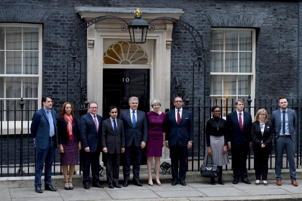 Prime Minister Theresa May poses with Brandon Lewis, James Cleverly and others at 10 Downing street as she reshuffles her cabinet in London, United Kingdom on January 8, 2018. Today's Cabinet reshuffle is Theresa May's third since becoming Prime Minister 
