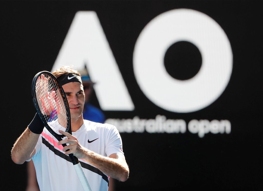 Roger Federer of Switzerland celebrates winning his fourth-round match against Marton Fucsovics of Hungary at the Australian Open Grand Slam tennis tournament in Melbourne, Australia, 22 January 2018. EPA/MAST IRHAM
