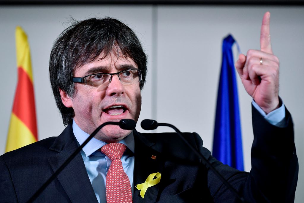 (FILES) This file photo taken on December 22, 2017 shows axed Catalan president Carles Puigdemont speaking after the results of the regional elections in Catalonia at the Square - Brussels Meeting Centre in Brussels. AFP / JOHN THYS