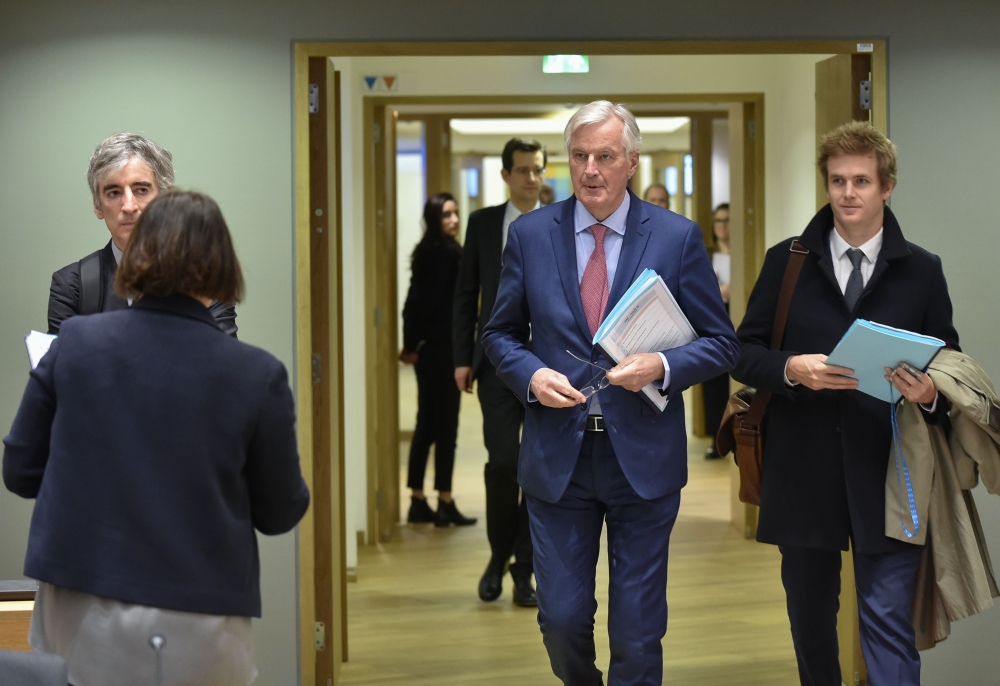 European Union Chief Negotiator in charge of Brexit negotiations Britain Michel Barnier (C) arrives for a General affairs council debate on the article 50 concerning Brexit in Brussels at the EU headquarters in Brussels on January 29, 2018.  AFP / JOHN TH