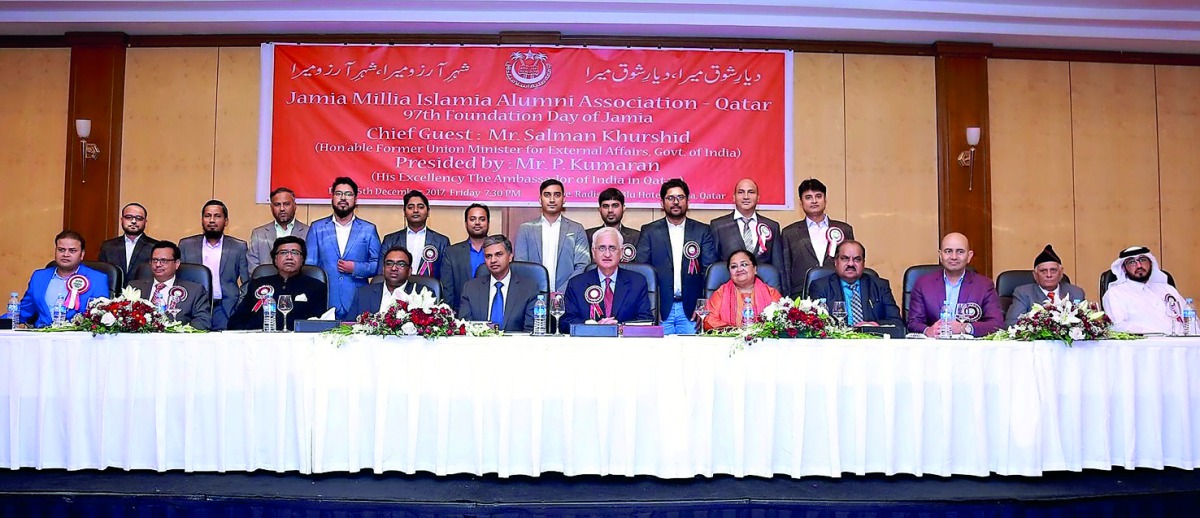 A group photo of guests with alumni team.
