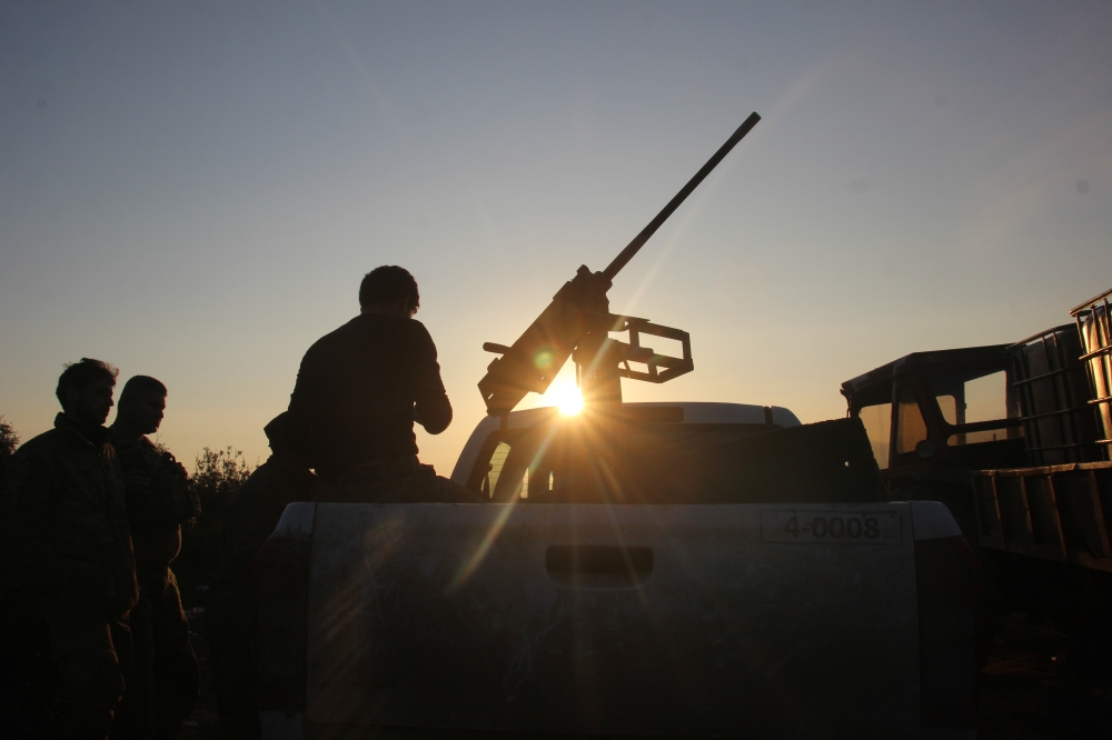 Members of Free Syrian Army (FSA), backed by Turkish Army, are seen after Turkish Armed Forces and Free Syrian Army cleared Mt. Ain al-Batman in Afrin's northwest of PYD/PKK terrorists within the 