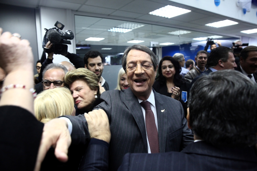 Incumbent Nicos Anastasiades, presidential candidate of the right-wing Democratic Rally party greets his supporters at the campaign headquarters in Nicosia, Cyprus January 28, 2018. Reuters/Yiannis Kourtoglou