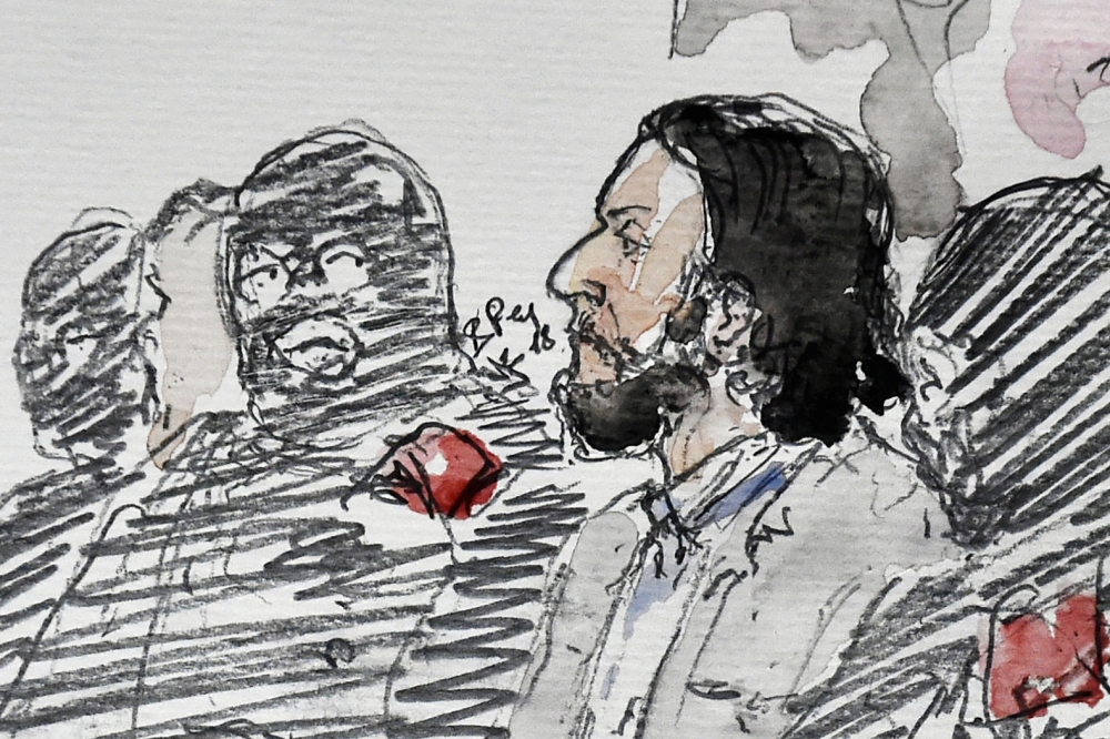 In this file courtroom sketch made on February 5, 2018 shows prime suspect in the November 2015 Paris attacks Salah Abdeslam (2nd L) prior to the opening of his trial at the 
