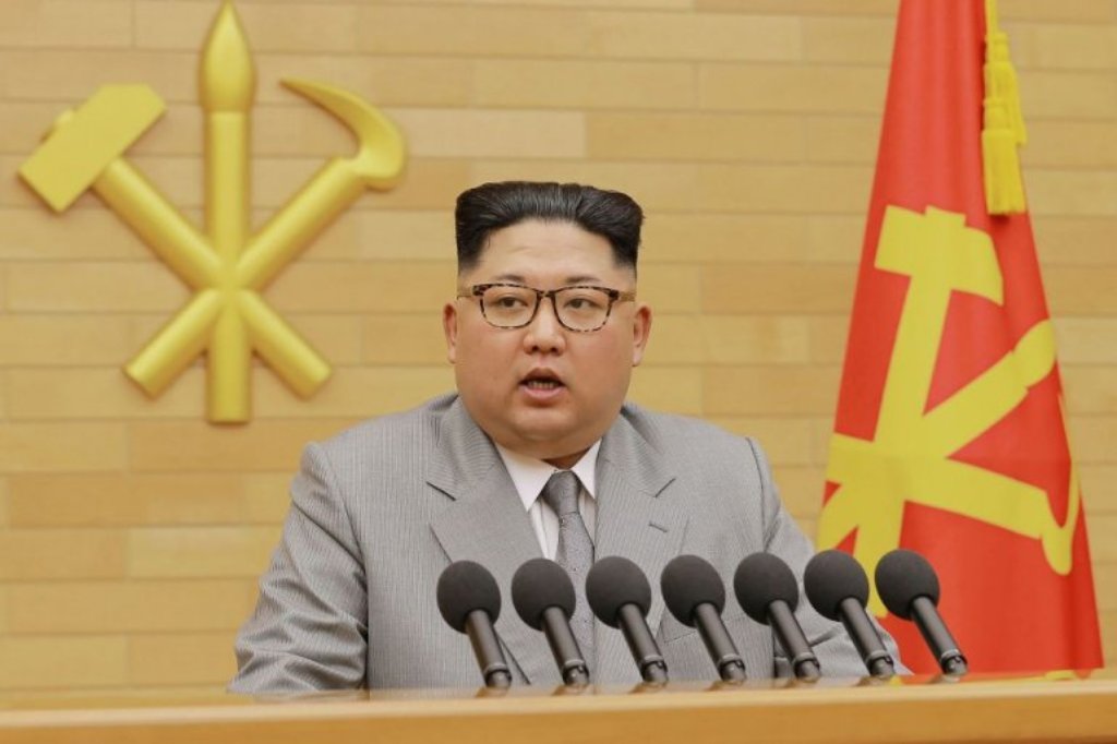 File picture of a picture North Korean leader Kim Jong-Un delivering a New Year's speech at an undisclosed location January 1, 2018. AFP PHOTO/KCNA VIA KNS
