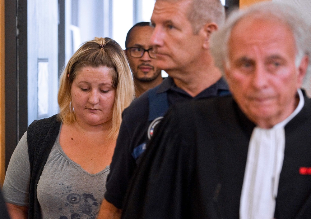File photo of Cecile Bourgeon (L), mother of the late Fiona, arriving with her lawyer Gilles-Jean Portejoie (R) at the court of Riom, central France, September 5, 2016.  / AFP / Thierry Zoccolan
