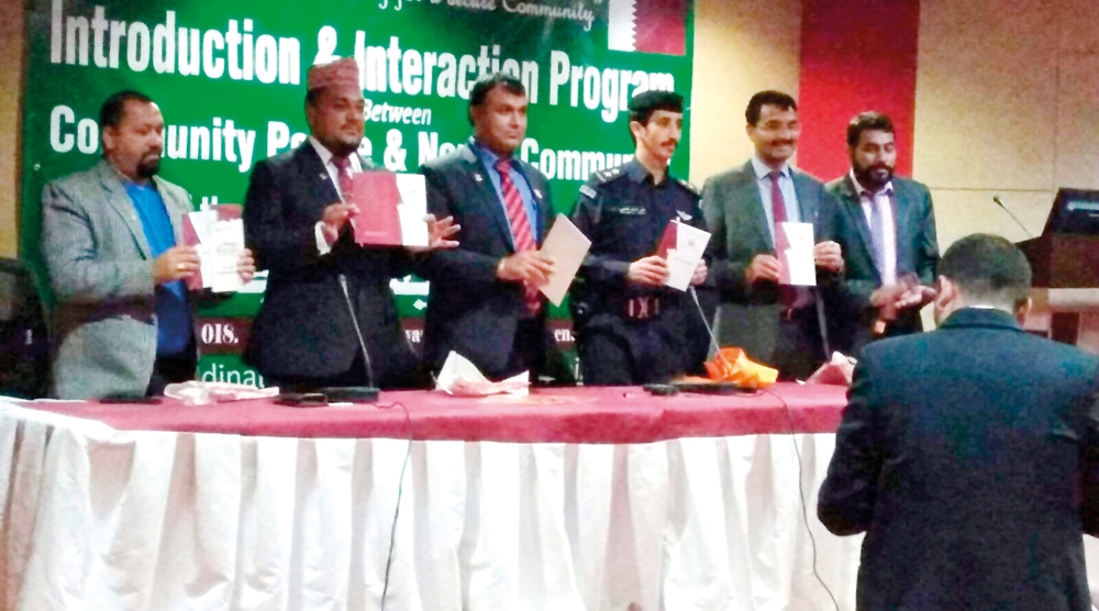 The participants showing the Nepali version of Qatar’s Labour Law.
