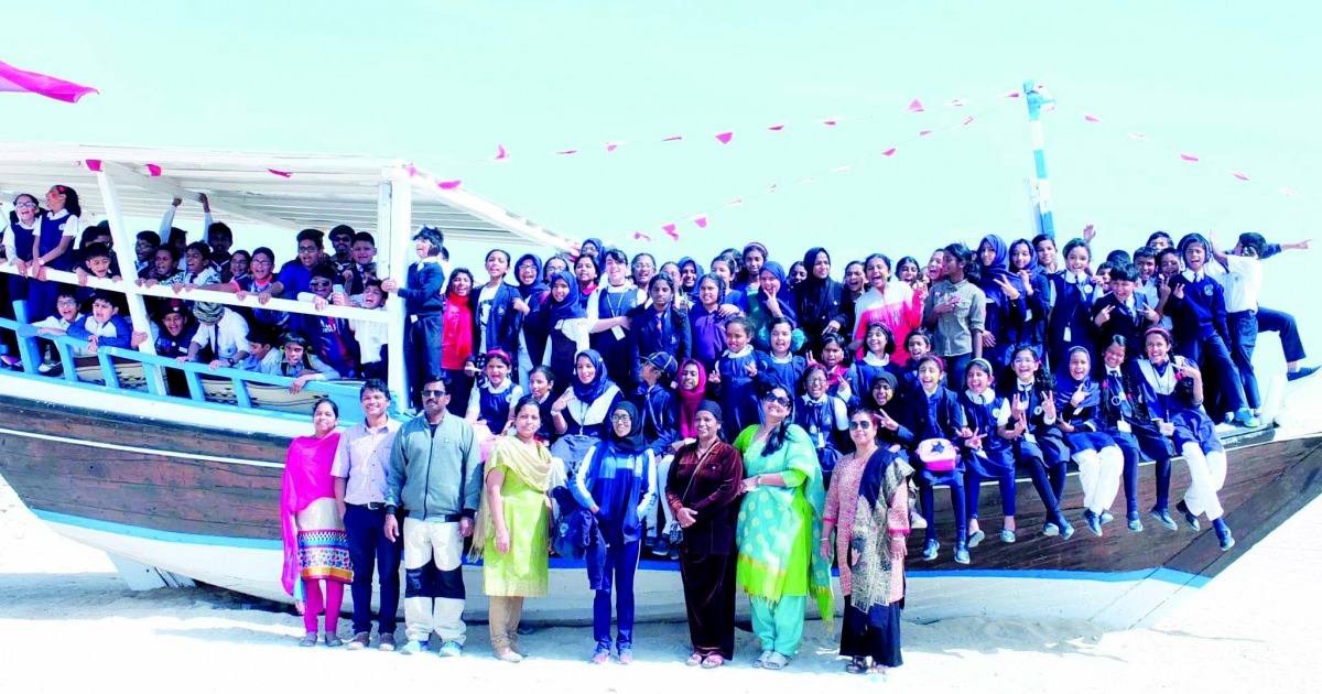 The students of MES Indian School with staff during the inaugural session of the 17th edition of “Flower of Each Spring” event in Al Khor . 
