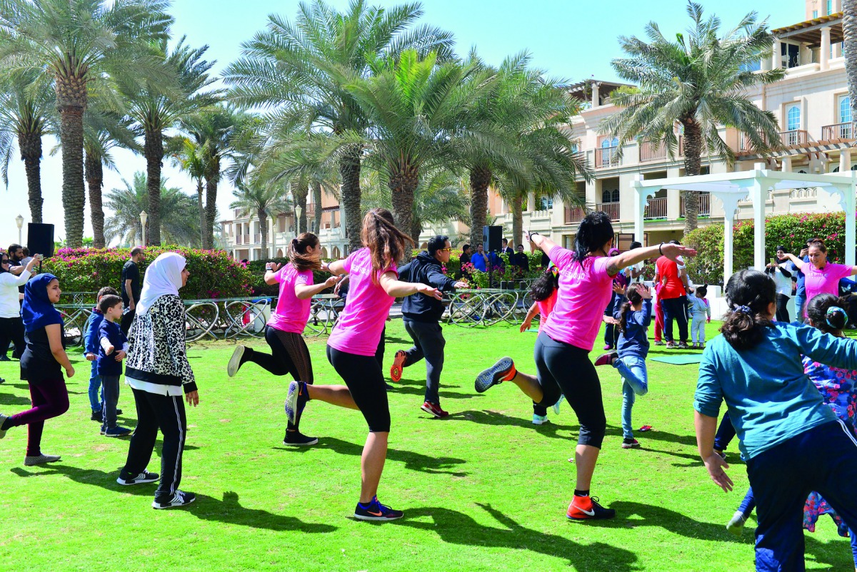People of all ages taking part in the National Sport Day activities led by Aspire Active trainers.