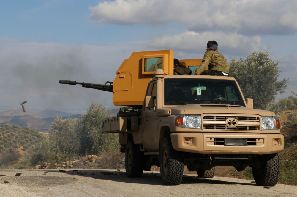 Members of Free Syrian Army (FSA) attack PYD/PKK positions as village of upper Hecika cleared of PYD/PKK terrorists within the 