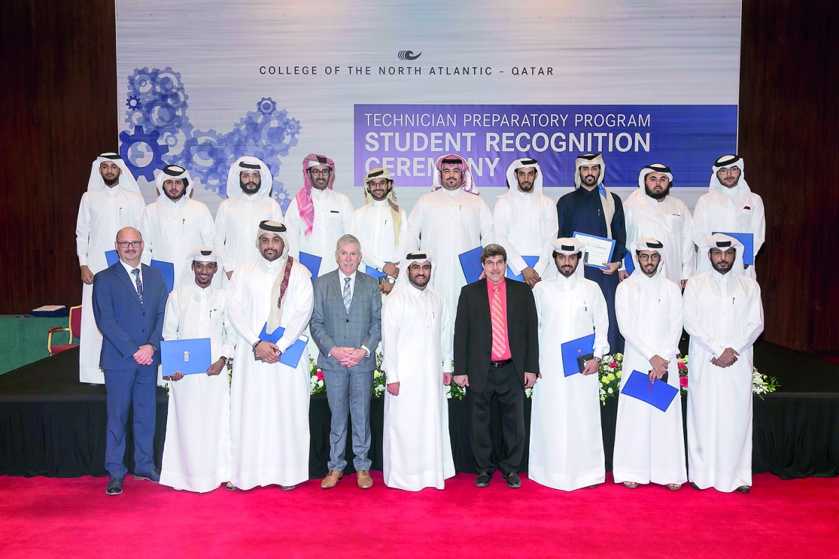 Officials and students during the honouring ceremony.