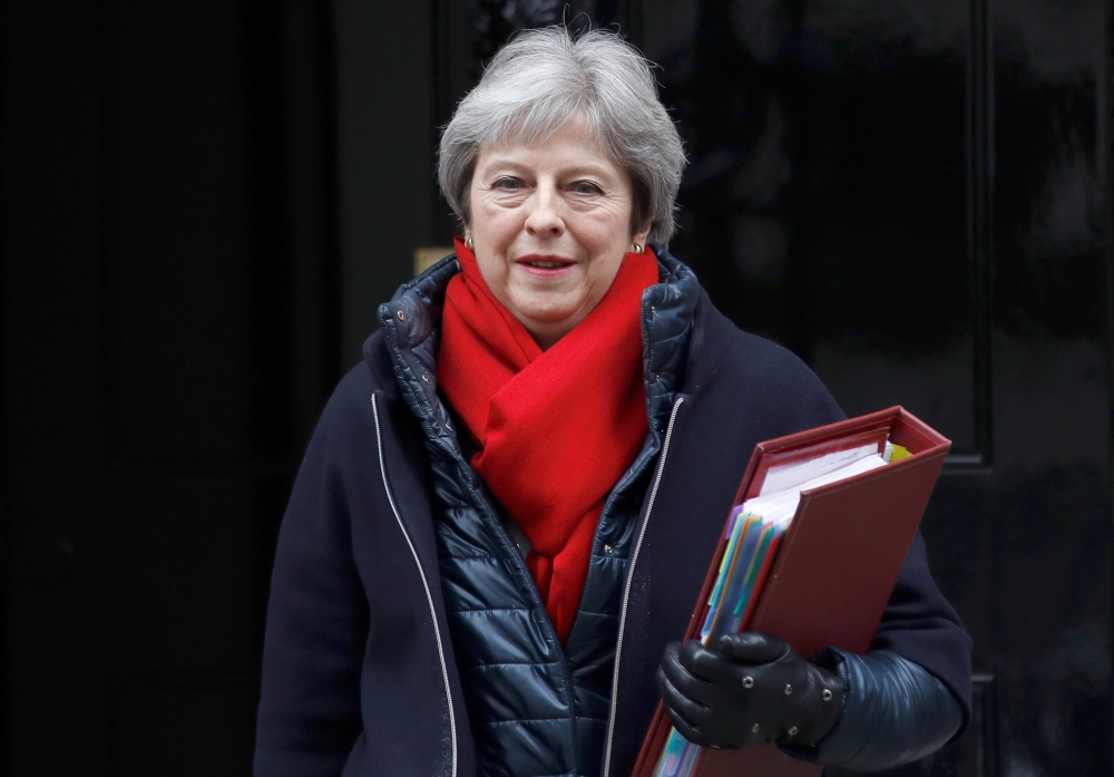 Britain's Prime Minister Theresa May leaves 10 Downing Street in London, Britain February 21, 2018. REUTERS/Peter Nicholls